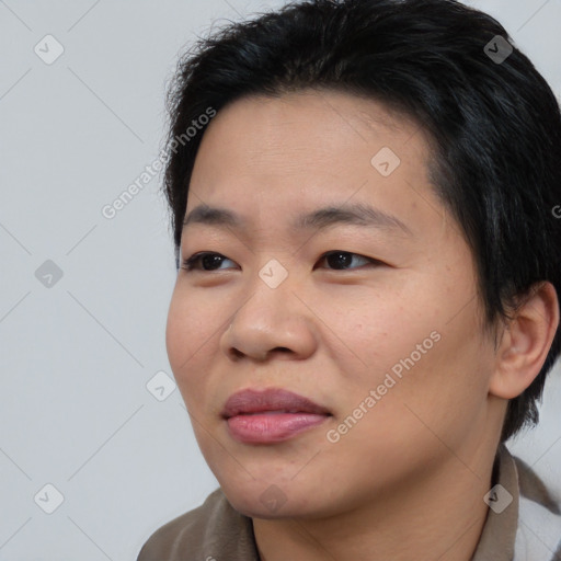 Joyful asian young-adult female with medium  brown hair and brown eyes