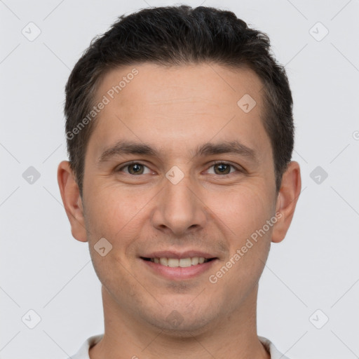 Joyful white young-adult male with short  brown hair and brown eyes