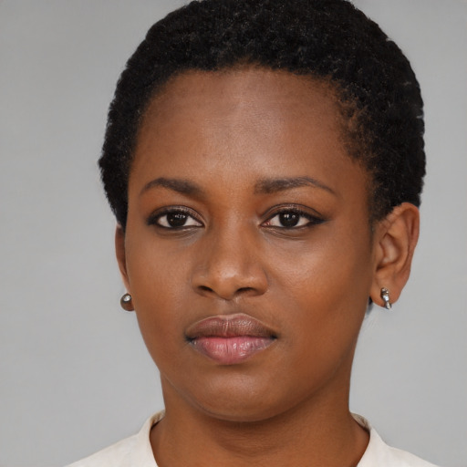 Neutral black young-adult female with short  black hair and brown eyes
