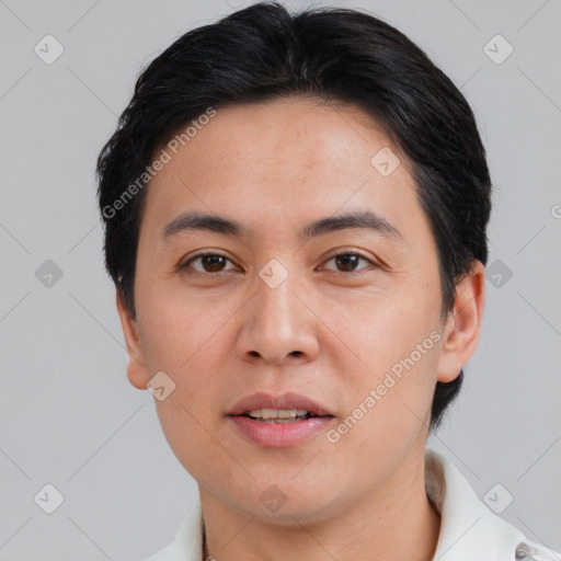 Joyful white young-adult male with short  black hair and brown eyes