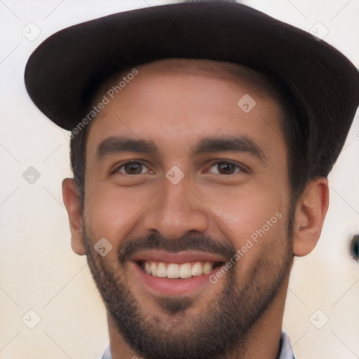 Joyful white young-adult male with short  black hair and brown eyes