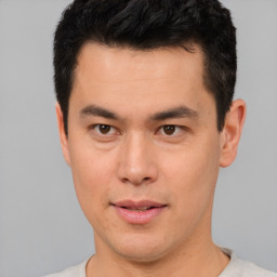 Neutral asian young-adult male with short  brown hair and brown eyes