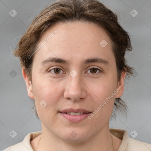 Joyful white adult female with medium  brown hair and brown eyes