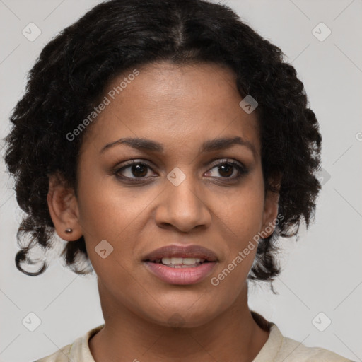 Joyful black young-adult female with medium  brown hair and brown eyes