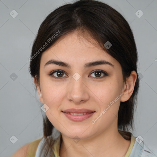 Joyful white young-adult female with medium  brown hair and brown eyes