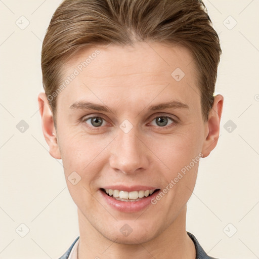 Joyful white young-adult female with short  brown hair and grey eyes