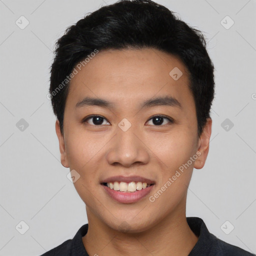 Joyful asian young-adult male with short  black hair and brown eyes