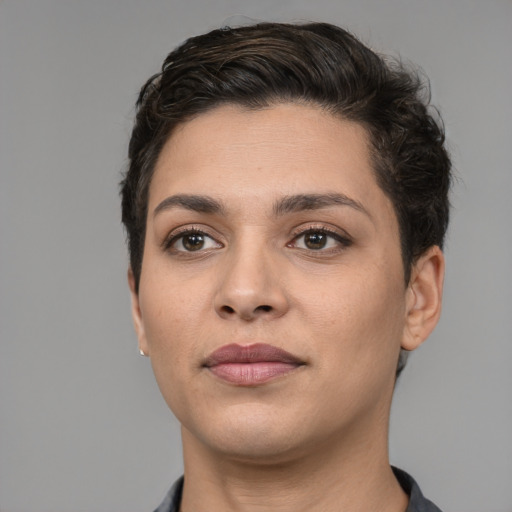 Joyful white young-adult female with short  brown hair and brown eyes