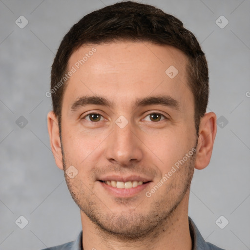 Joyful white young-adult male with short  brown hair and brown eyes