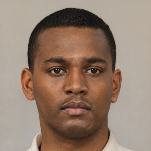 Neutral black young-adult male with short  brown hair and brown eyes