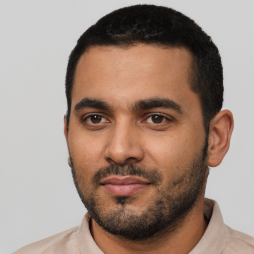 Neutral latino young-adult male with short  black hair and brown eyes