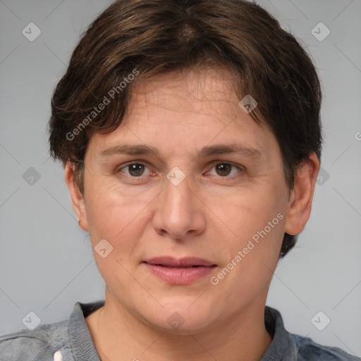 Joyful white adult female with short  brown hair and brown eyes