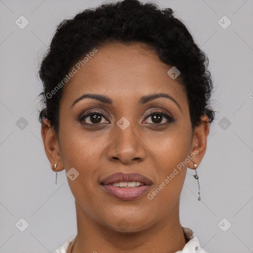 Joyful latino adult female with short  brown hair and brown eyes