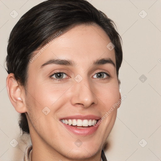 Joyful white young-adult female with short  brown hair and brown eyes