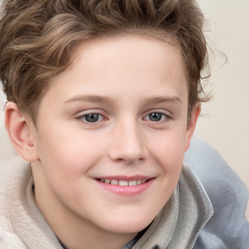 Joyful white child female with short  brown hair and blue eyes