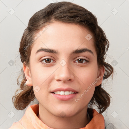 Joyful white child female with medium  brown hair and brown eyes