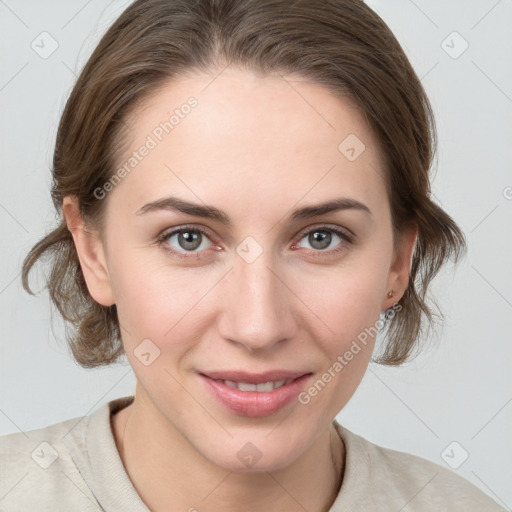 Joyful white young-adult female with medium  brown hair and grey eyes