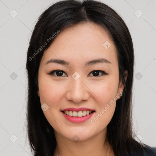 Joyful asian young-adult female with long  brown hair and brown eyes