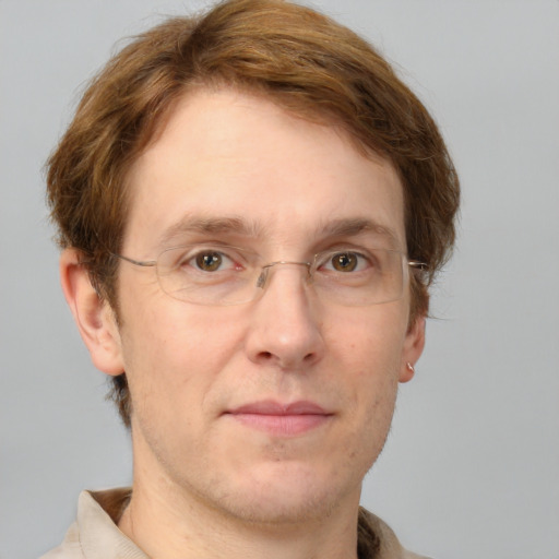 Joyful white adult male with short  brown hair and grey eyes