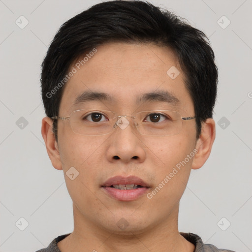 Neutral asian young-adult male with short  brown hair and brown eyes