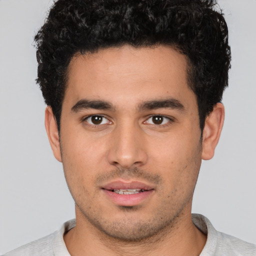 Neutral white young-adult male with short  black hair and brown eyes