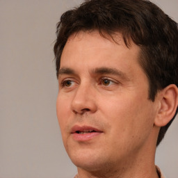 Neutral white adult male with short  brown hair and brown eyes