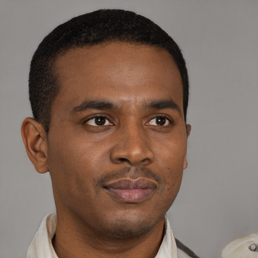 Neutral black young-adult male with short  brown hair and brown eyes
