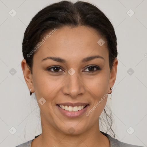 Joyful latino young-adult female with short  brown hair and brown eyes