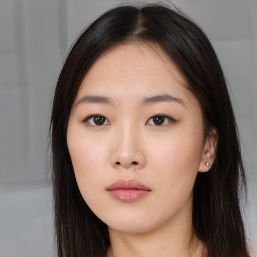 Neutral asian young-adult female with long  brown hair and brown eyes