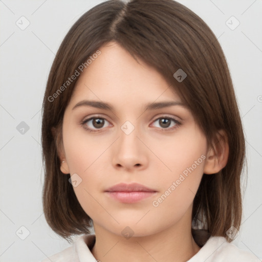 Neutral white young-adult female with medium  brown hair and brown eyes