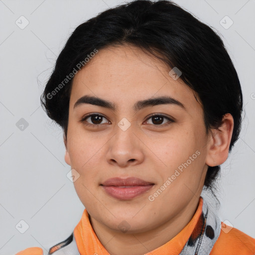 Joyful latino young-adult female with medium  brown hair and brown eyes