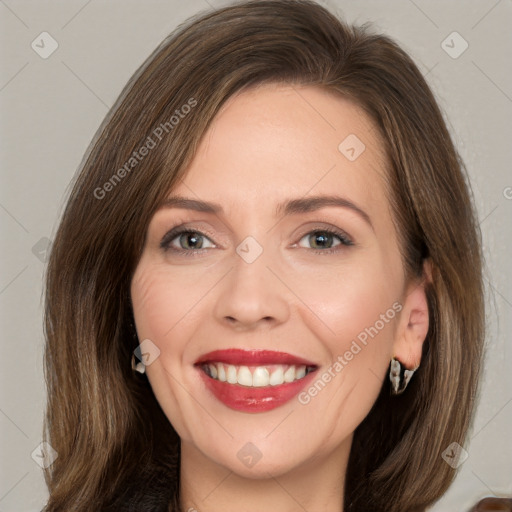 Joyful white young-adult female with medium  brown hair and green eyes