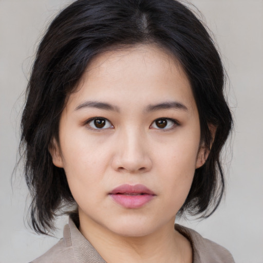 Neutral white young-adult female with medium  black hair and brown eyes