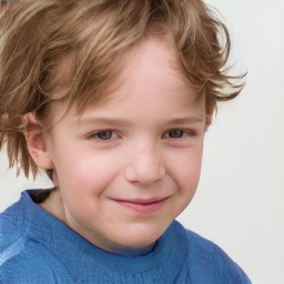 Joyful white child female with short  brown hair and blue eyes