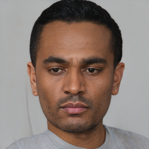 Neutral black young-adult male with short  black hair and brown eyes