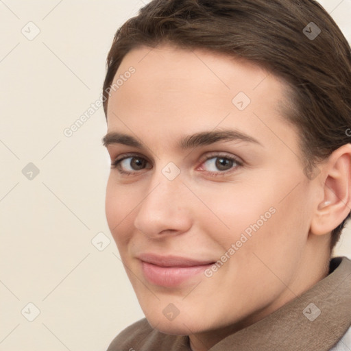 Joyful white young-adult female with short  brown hair and brown eyes