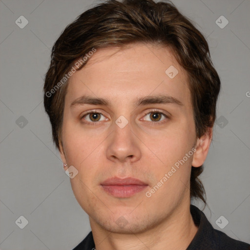 Neutral white young-adult male with short  brown hair and brown eyes