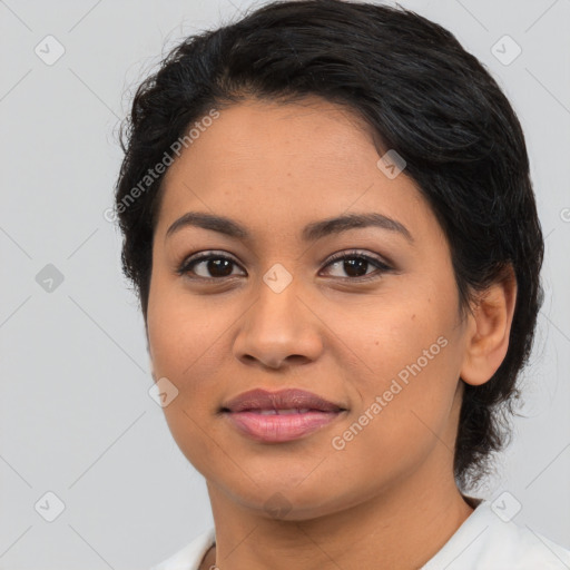 Joyful asian young-adult female with medium  black hair and brown eyes