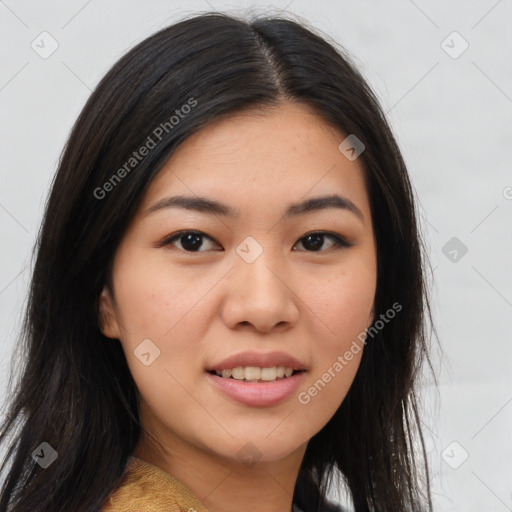 Joyful asian young-adult female with long  brown hair and brown eyes