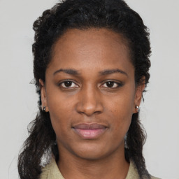 Neutral black young-adult female with short  black hair and brown eyes