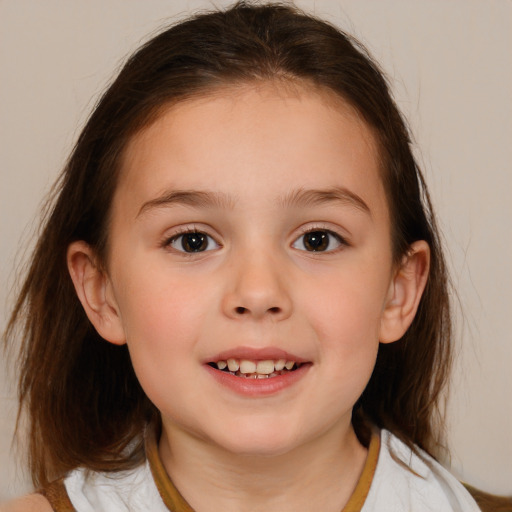 Joyful white child female with medium  brown hair and brown eyes