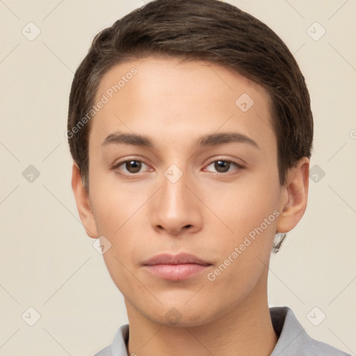 Neutral white young-adult male with short  brown hair and brown eyes