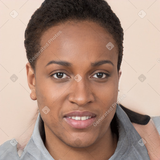 Joyful black young-adult female with short  brown hair and brown eyes