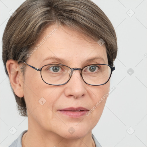 Joyful white adult female with short  brown hair and grey eyes