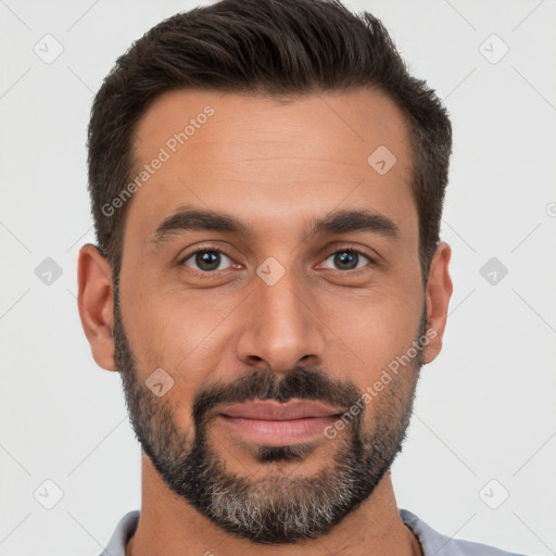 Joyful white young-adult male with short  brown hair and brown eyes