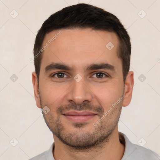 Joyful white young-adult male with short  brown hair and brown eyes