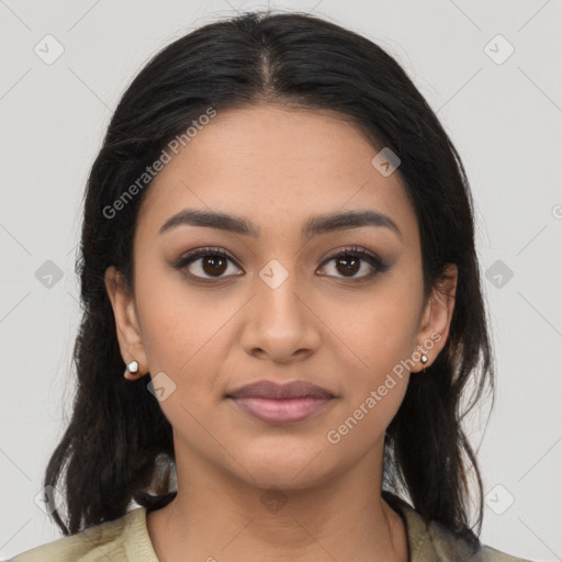 Joyful latino young-adult female with medium  black hair and brown eyes