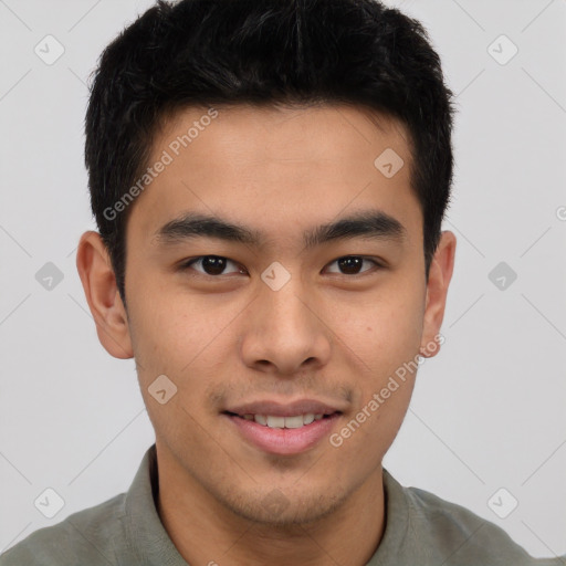 Joyful asian young-adult male with short  brown hair and brown eyes