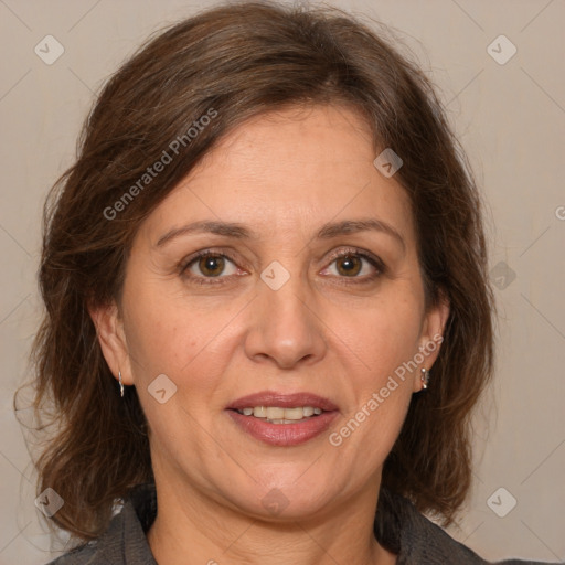 Joyful white adult female with medium  brown hair and brown eyes