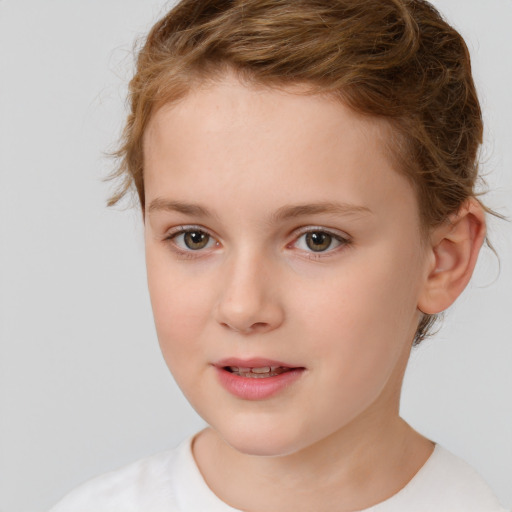 Joyful white child female with short  brown hair and brown eyes